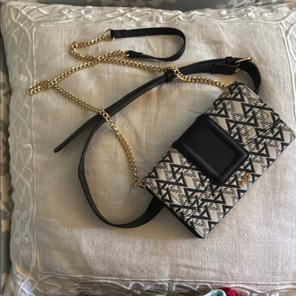 Aldo Black and Beige Crossbody Bag with Chain Detail convertible belt bag.